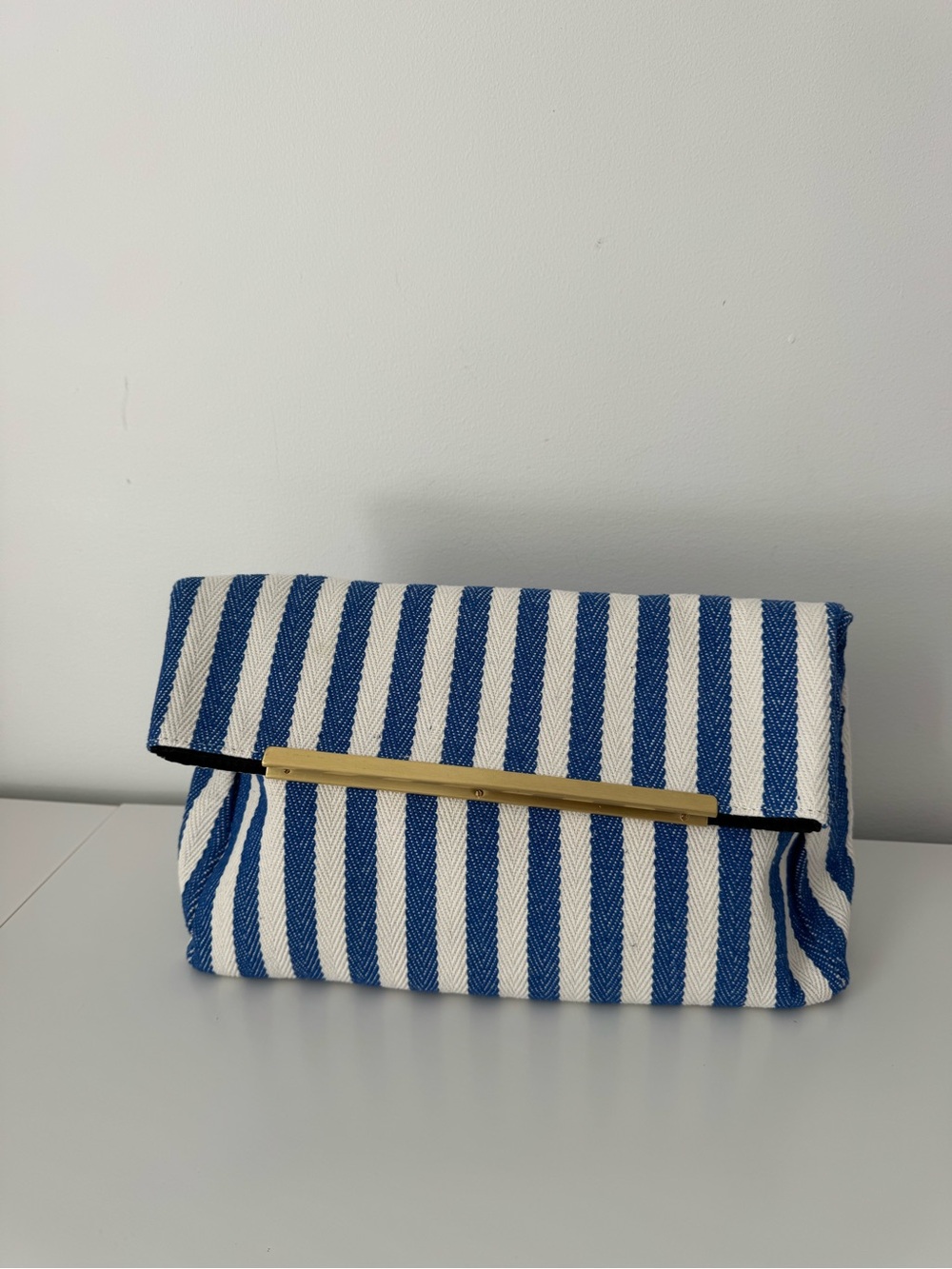 ASOS Blue and White Striped Fold-Over Clutch with Gold Bar